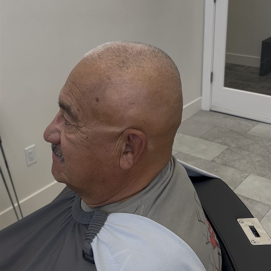 Close shaved haircut, left profile